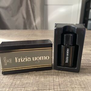 Vintage Krizia Uomo by Krizia -Cologne 
0.169 fl.oz /5 ml Eau De Toilette SPLASH